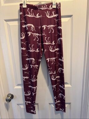 Modcloth Maroon Leggings with White Dinosaur Skeleton Print